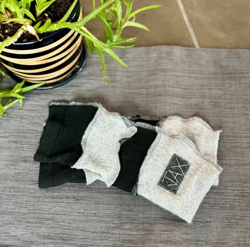 Grey and black upcycled Cashmere fingerless gloves. Rescued and recycled cashmere born again.
