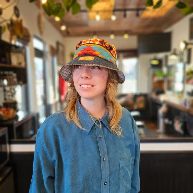 Upcycled mix Southwestern fleece turned into an Adult bucket reversible