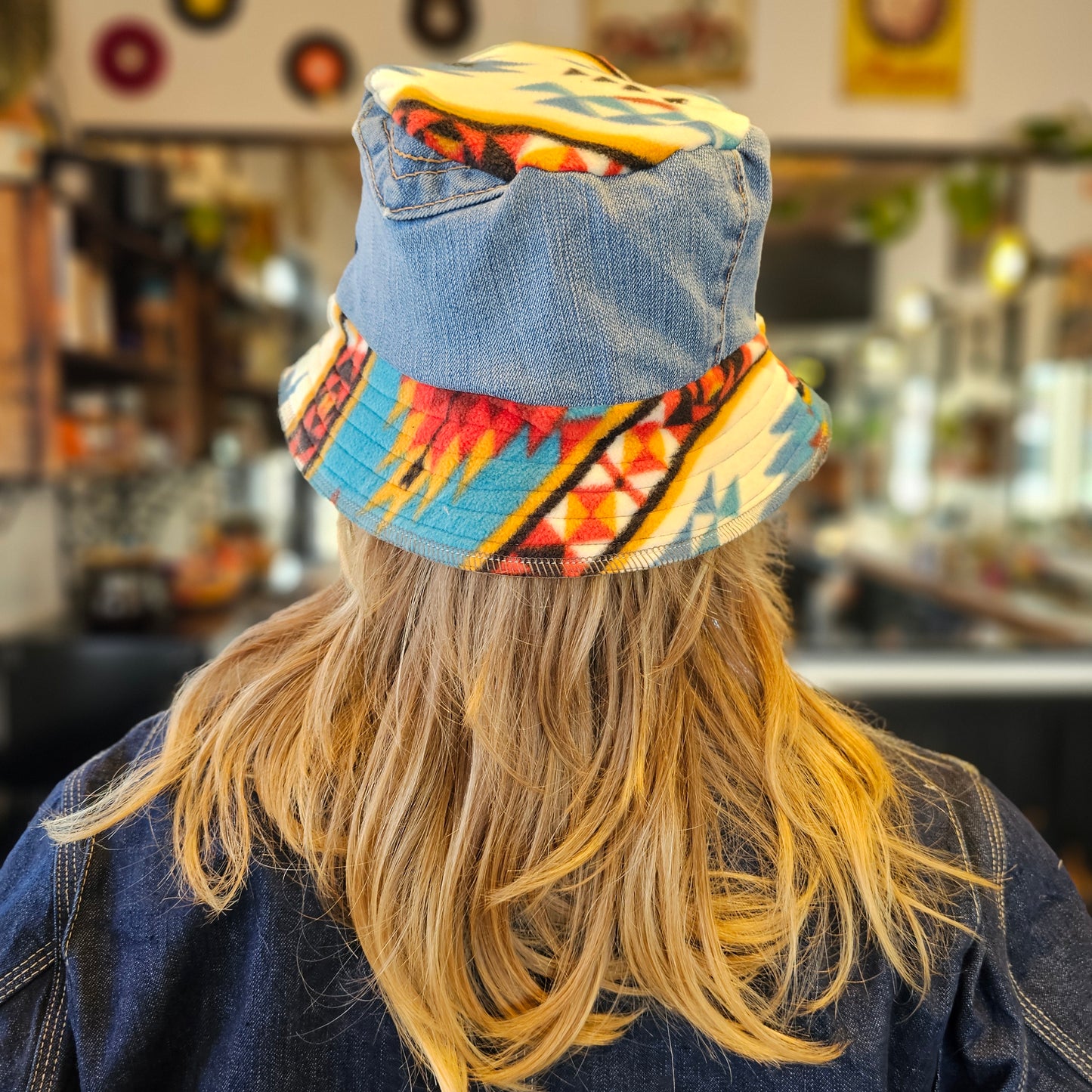 Upcycled mix Southwestern fleece turned into an Adult bucket reversible