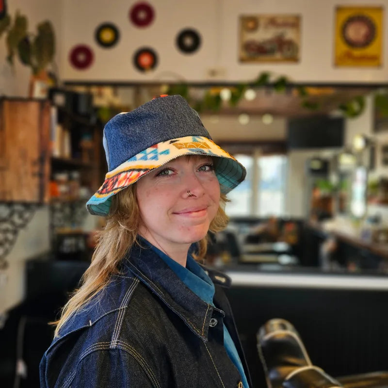 Upcycled mix Southwestern fleece turned into an Adult bucket reversible