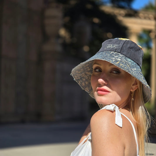 Upcycled sun hat made with black Denim jeans and Upcycled upholstery