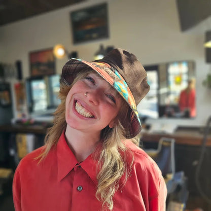 Upcycled mix Southwestern fleece turned into an Adult bucket reversible
