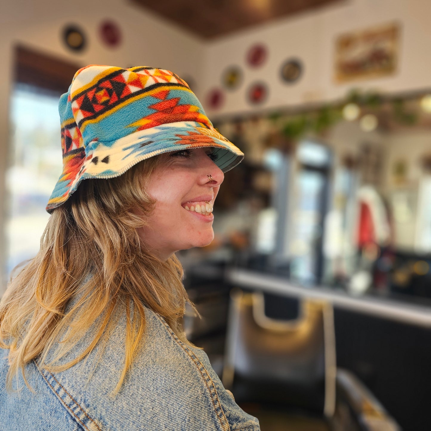 Upcycled solid Southwestern fleece turned into an Adult OS bucket reversible