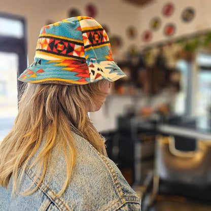 Upcycled solid Southwestern fleece turned into an Adult OS bucket reversible