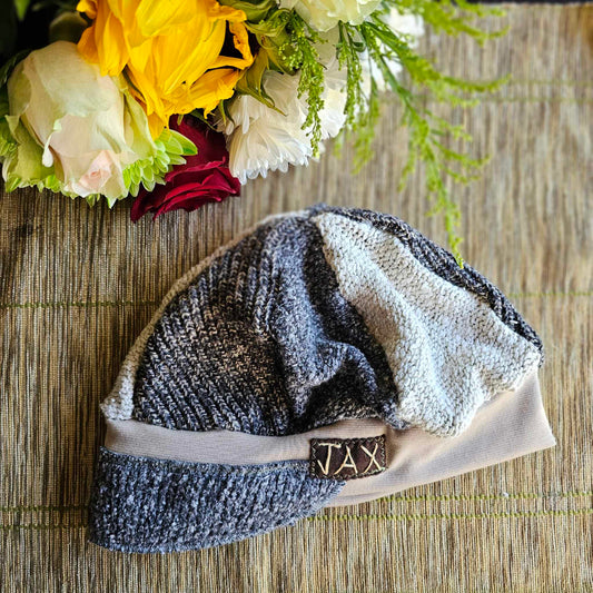 Upcycled Grey mixed sweaters on taupe JAX flapper